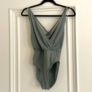 Safe green body suit